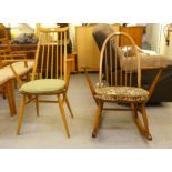 An Ercol honey coloured beech and elm framed, high hoop and spindled back, open arm rocking chair