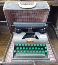 A vintage Llilliput typewriter  cased