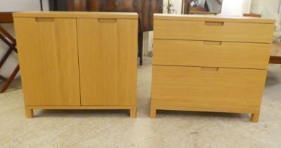 Modern light oak finished furniture, viz. a three drawer dressing chest, on a plinth  29"h  32"w;