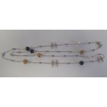 A silver coloured metal designer necklace set with freshwater pearl beads