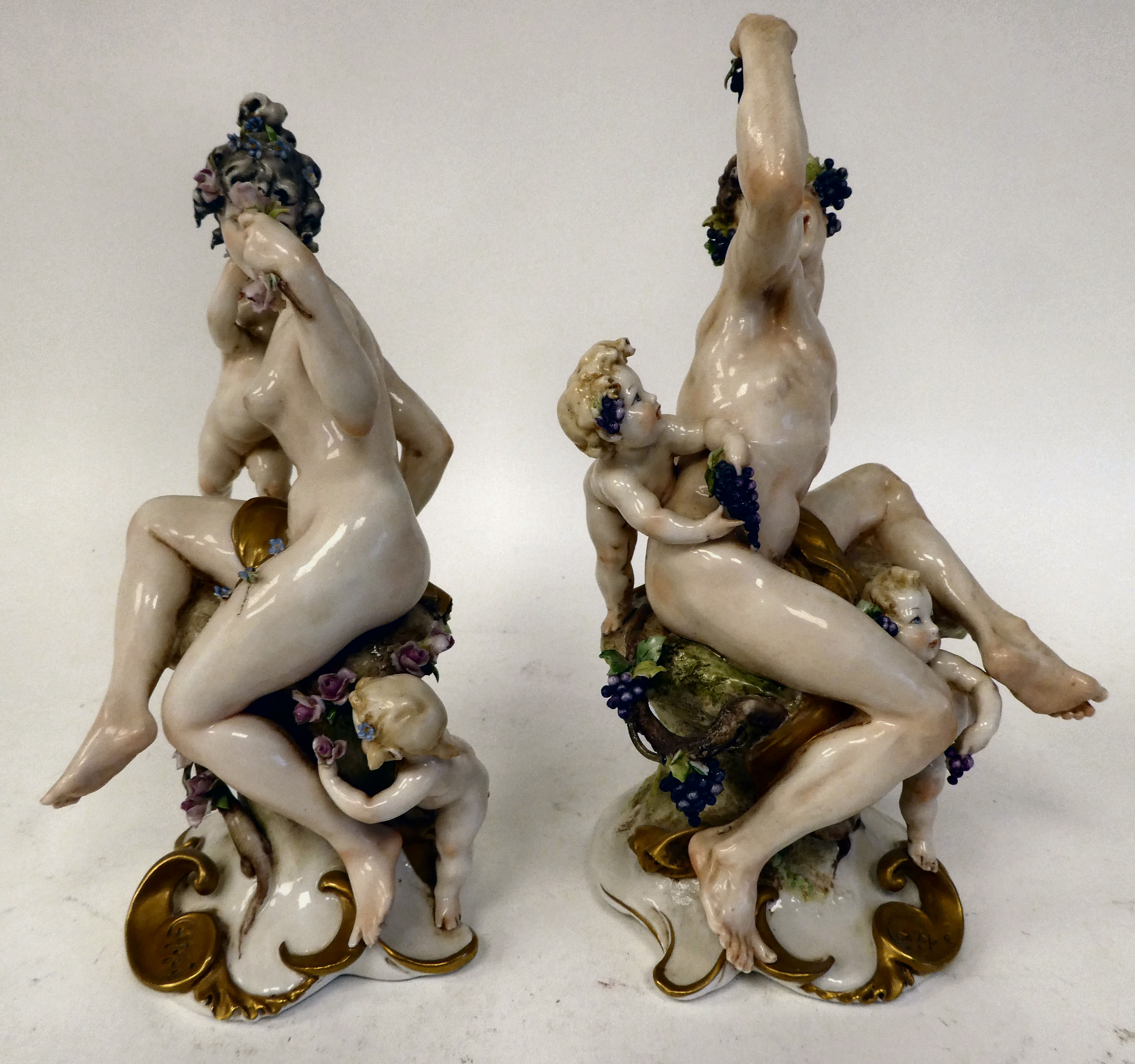A pair of 20thC Naples porcelain, classically inspired figures with cherubic children  8.5" & 9"h - Image 2 of 4