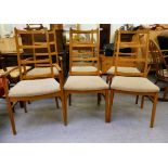 A set of six modern, teak framed, ladderback dining chairs with oatmeal coloured upholstered