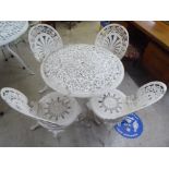 A Victorian style white painted, metal terrace table  26"h  29"dia; and a set of four matching