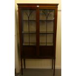 An Edwardian mahogany two door display cabinet, raised on square, tapered legs  "h