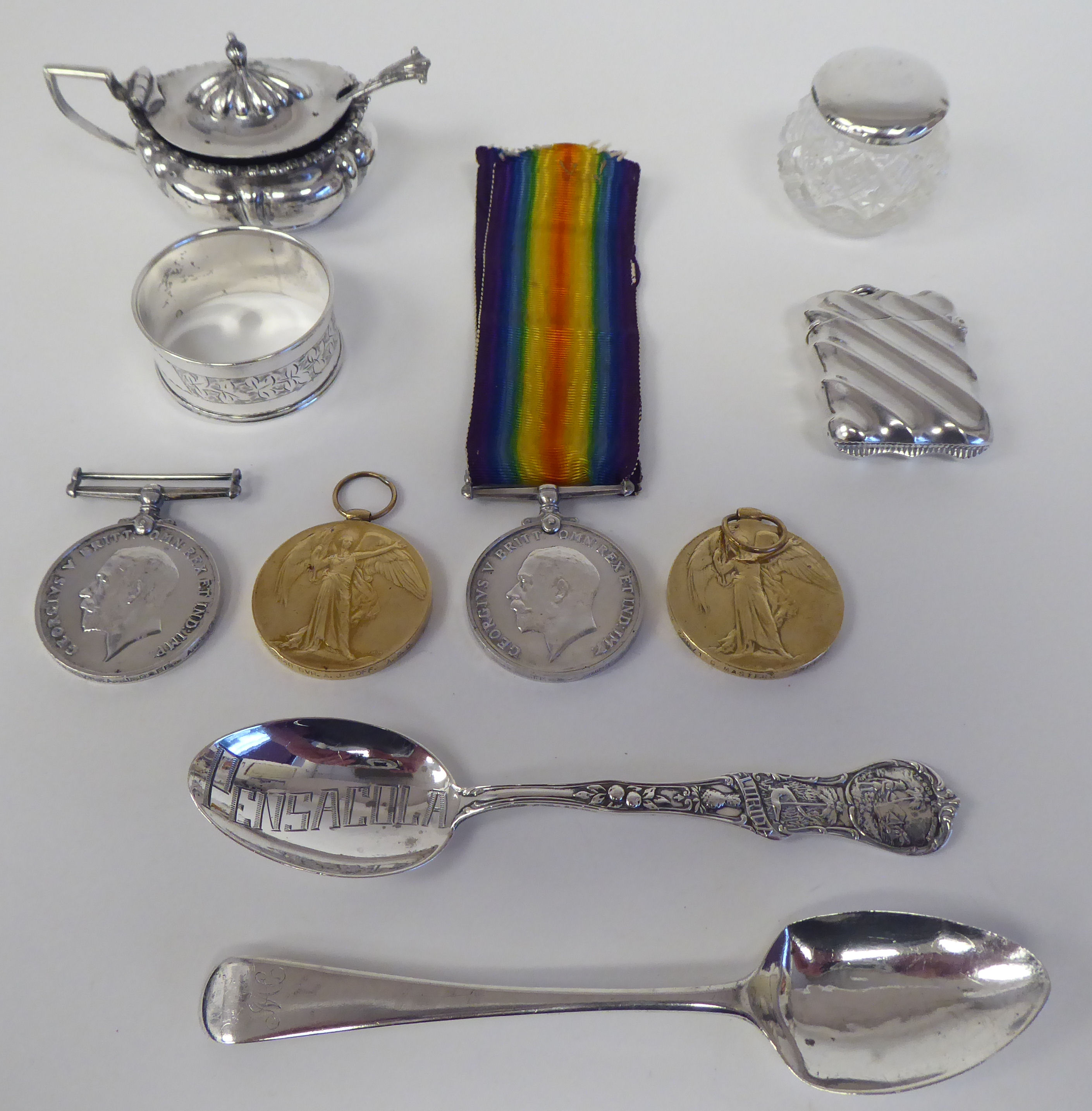 Silver collectables: to include two teaspoons; a flute moulded vesta case; and four Great War