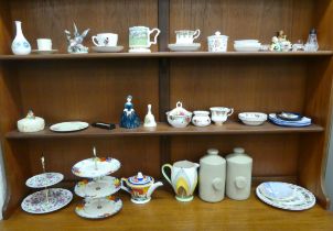 Collectable ceramics: to include a Lladro porcelain bird ornament; a Bizarre china coffee can and