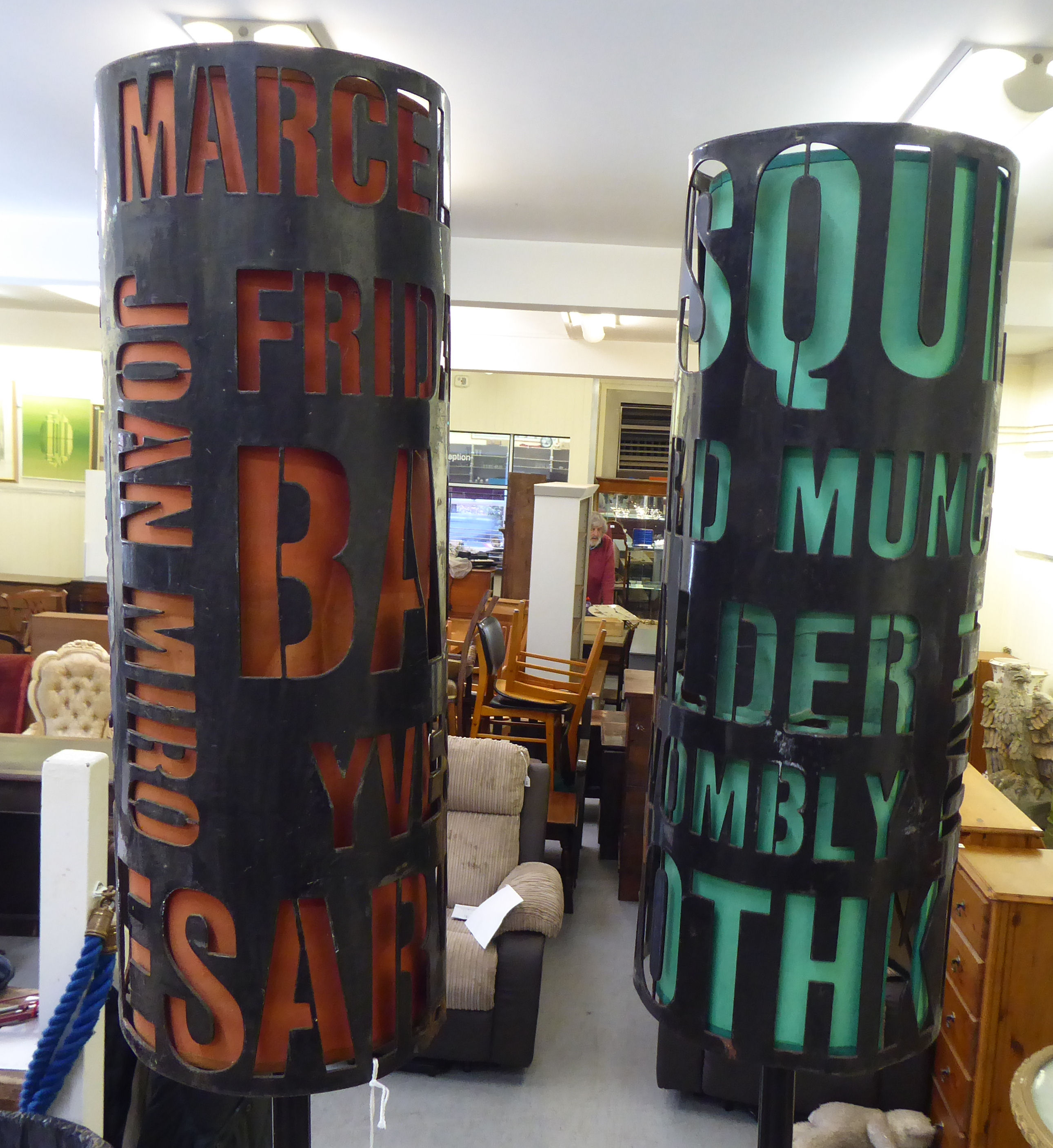 A pair of vintage black enamelled steel, floorstanding lamps, the cylindrical shades featuring - Image 2 of 3