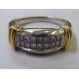 A bi-coloured gold diamond set ring  (stamped 18k)