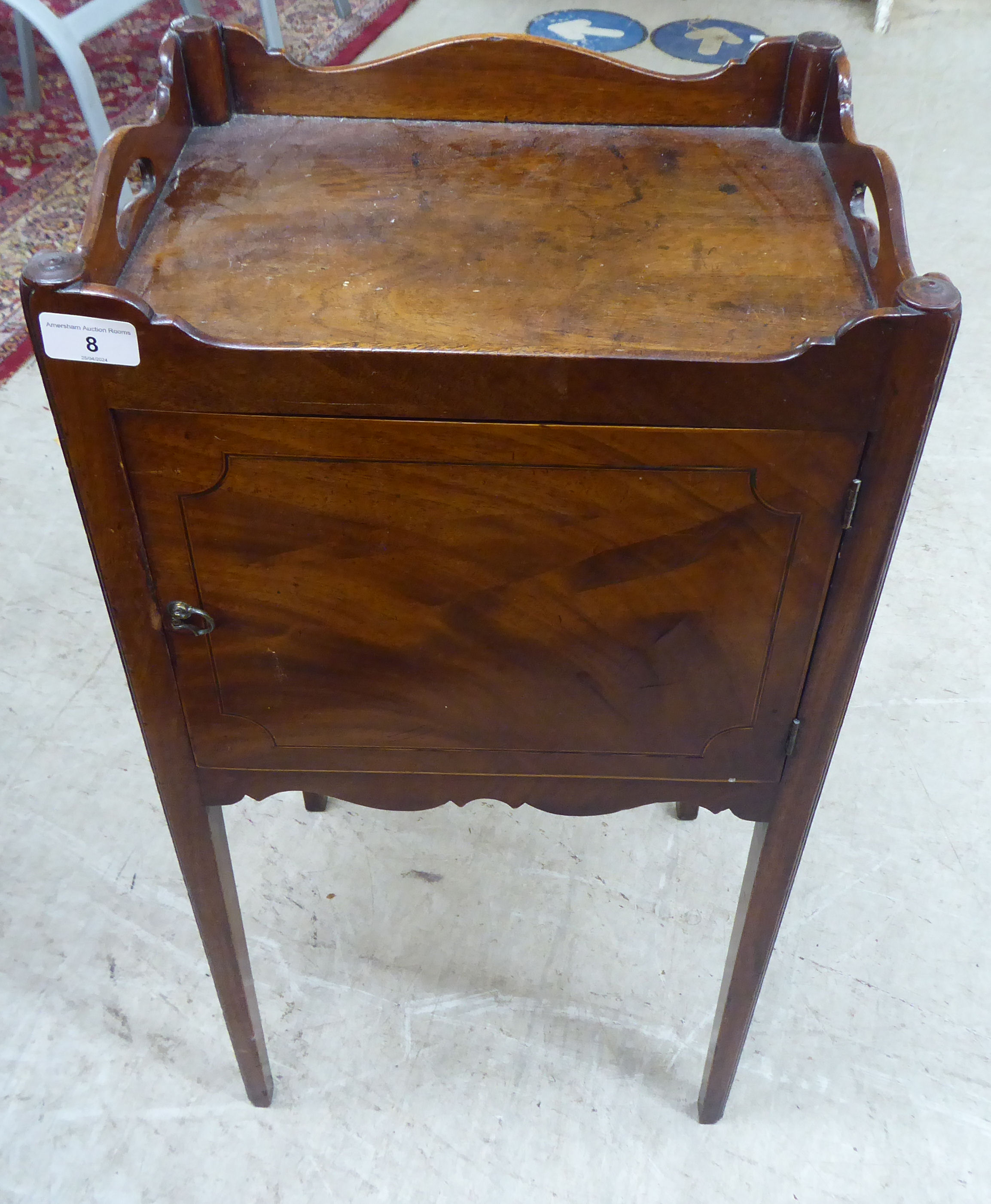 A George III mahogany night commode with a shallow gallery top, over a cupboard door, raised on - Image 2 of 4