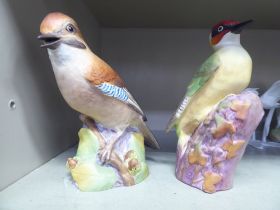 Two Royal Worcester china bird ornaments, viz. 'Jay'  6"h; and 'Woodpecker'  5"h