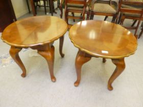 A pair of modern mahogany lamp tables, each with a drawer, raised on cabriole legs  20"h  22"w