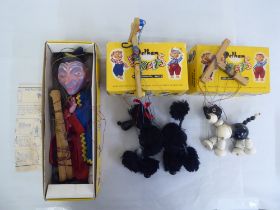 Three Pelham puppets, viz. two dogs; and a wizard  all boxed