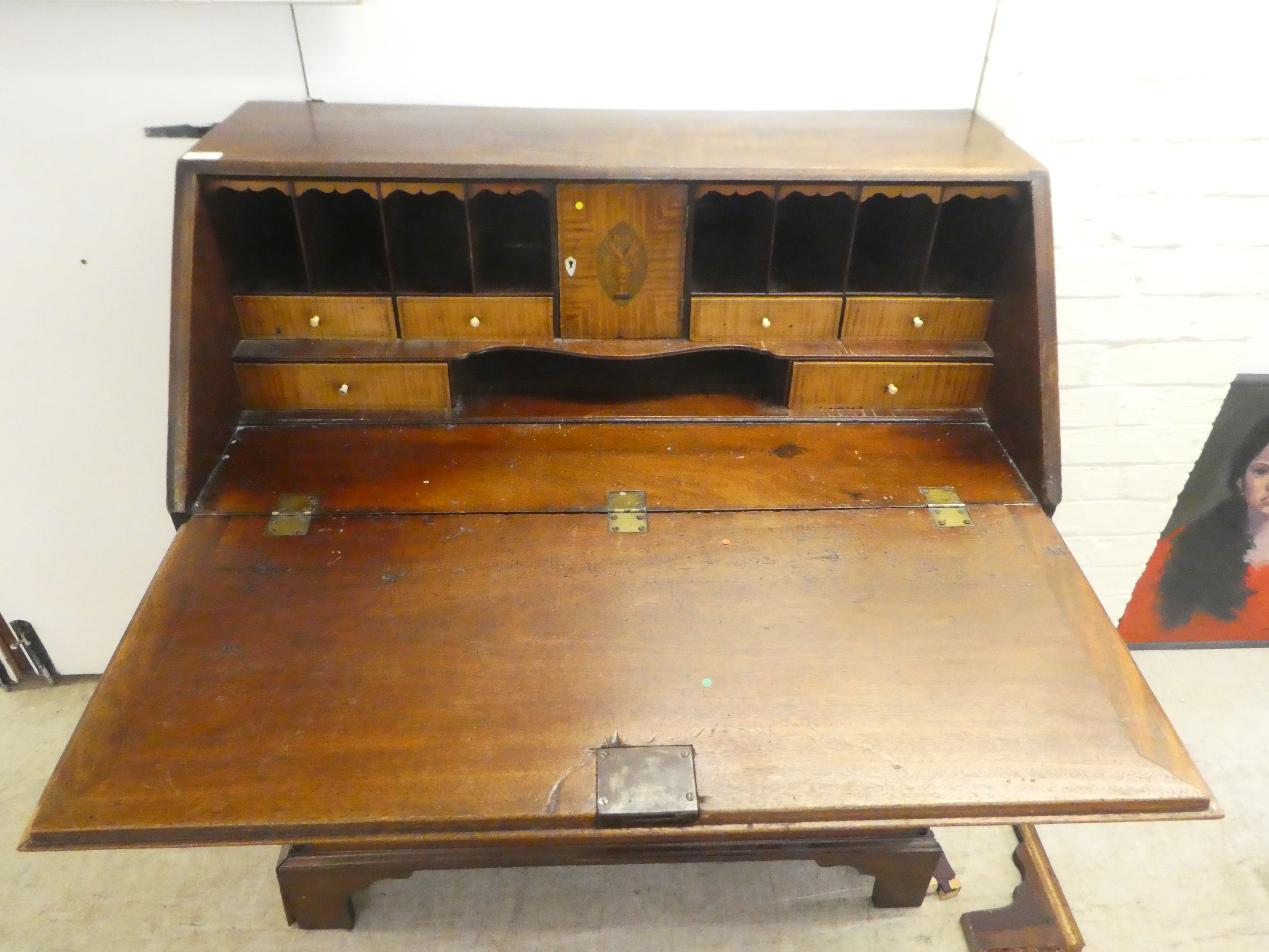 A George III mahogany bureau, the fall-flap enclosing four long graduated drawers, raised on bracket - Image 4 of 7