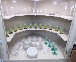Glassware: to include green tinted pedestal wines and clear glass place settings