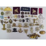 Mainly military badges and other emblems: to include Royal Scots Greys; and 19thC (Alexandra) PWO