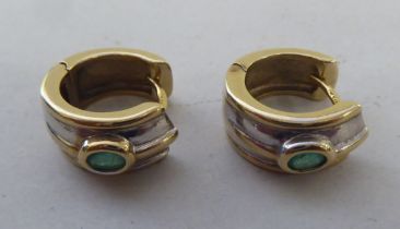 A pair of 9ct gold emerald set earrings