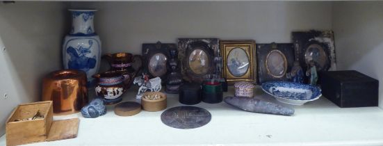 A mixed lot: to include a white metal coated deity  5"h; a Victorian copper mould; and a Great War