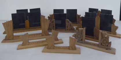 A collection of Art Deco carved beech, freestanding photograph frames  various sizes