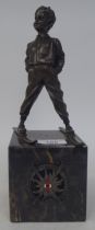 After Johann Ferdinind Preiss - 'Ski-Boy' a cast bronze figure, on a marble plinth with an applied