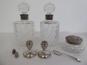 Silver collectables: to include a pair of dwarf candlesticks; and dressing table items  mixed marks