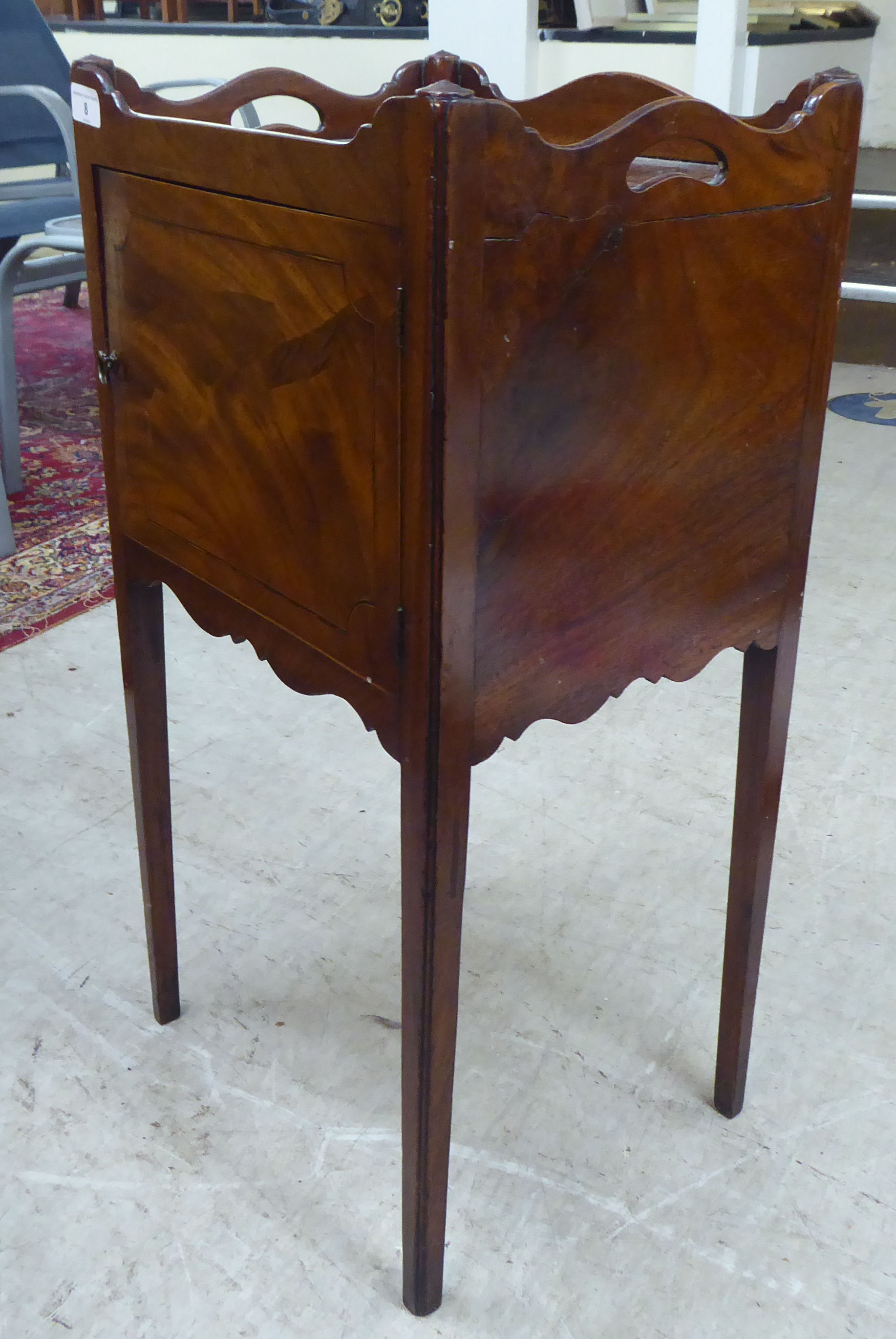 A George III mahogany night commode with a shallow gallery top, over a cupboard door, raised on - Image 4 of 4