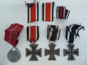 World War II military medals: to include an Iron Cross (Please Note: this lot is subject to the