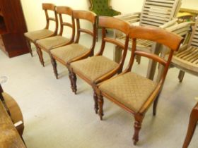 A set of five William IV mahogany framed dining chairs, each with a drop-in seat, raised on