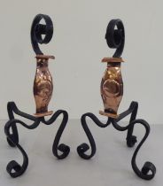 A pair of Arts & Crafts wrought iron and copper firedogs  15"h