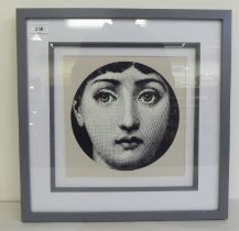 After Fornasetti - a female head shot  monochrome print  9"dia  framed