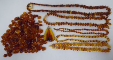 Amber coloured bead necklaces