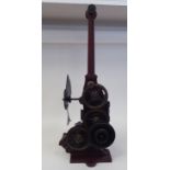 A Pathe Freres, Paris, circa 1906 maroon painted iron, hand crank projector  No.4582, on a plinth