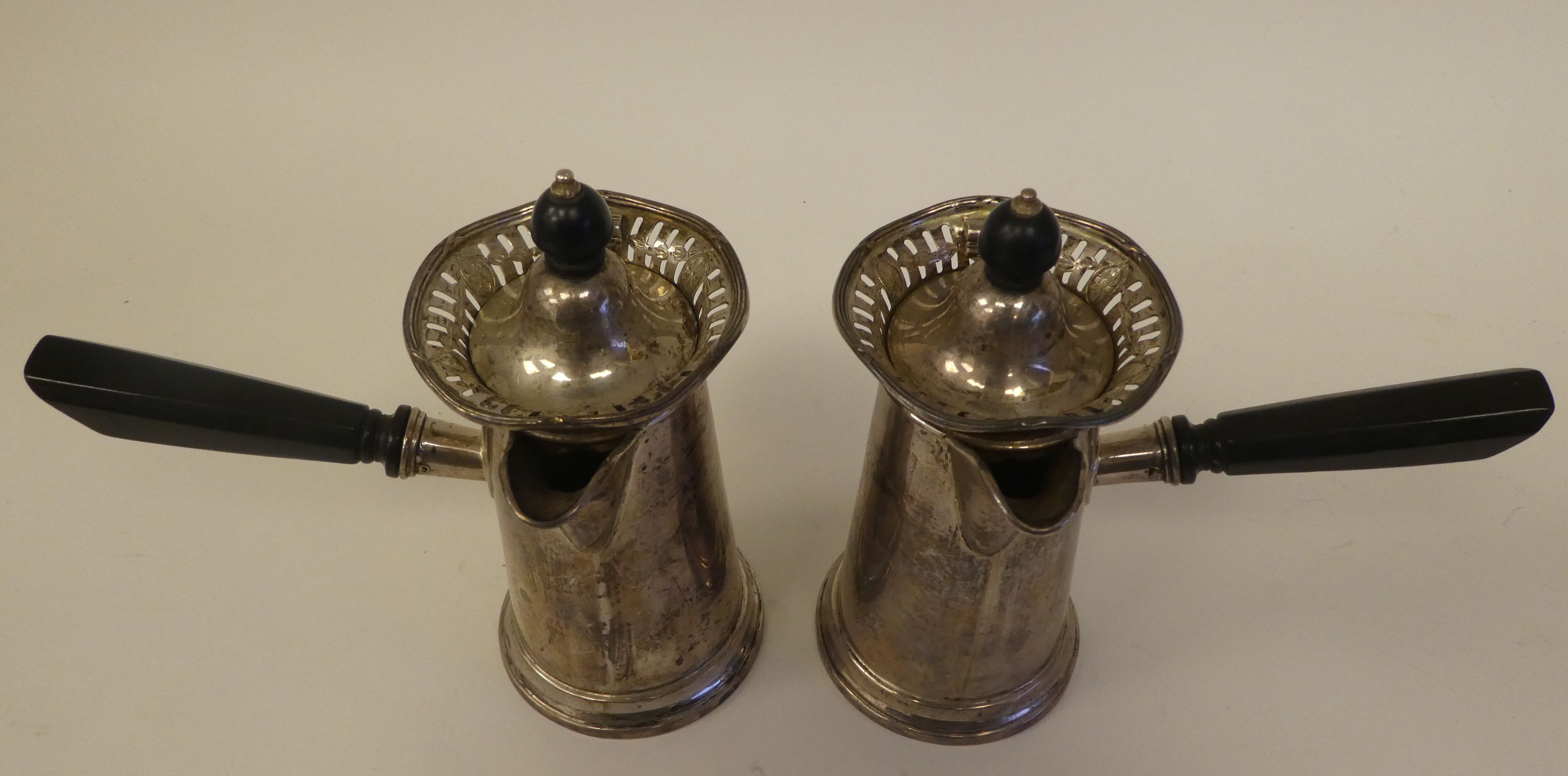 A pair of silver chocolate pots of tapered, cylindrical form with decoratively pierced and flared - Image 2 of 6