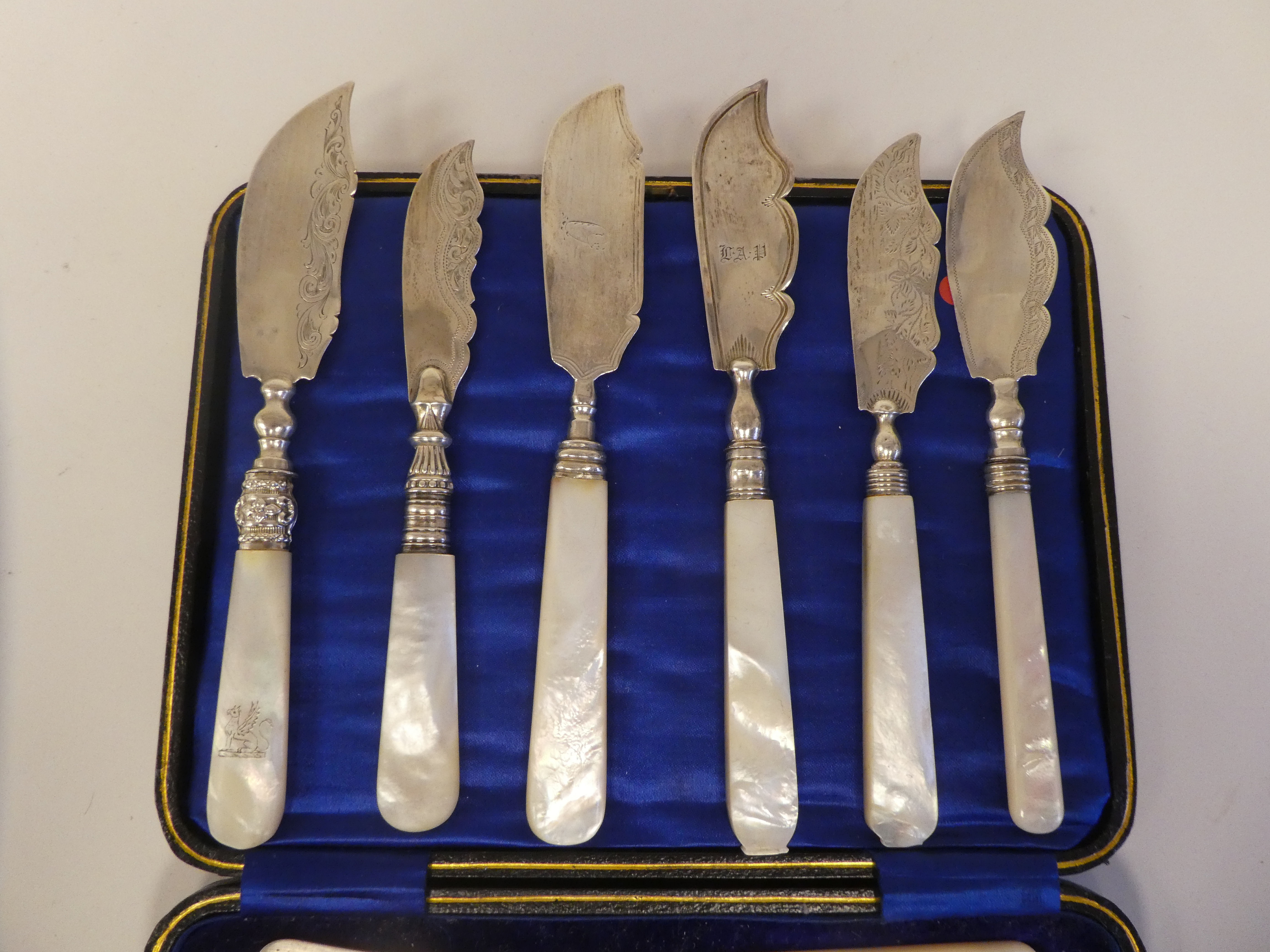A set of six silver dessert knives, on mother-of-pearl handles  cased; and a matched set of - Image 7 of 7