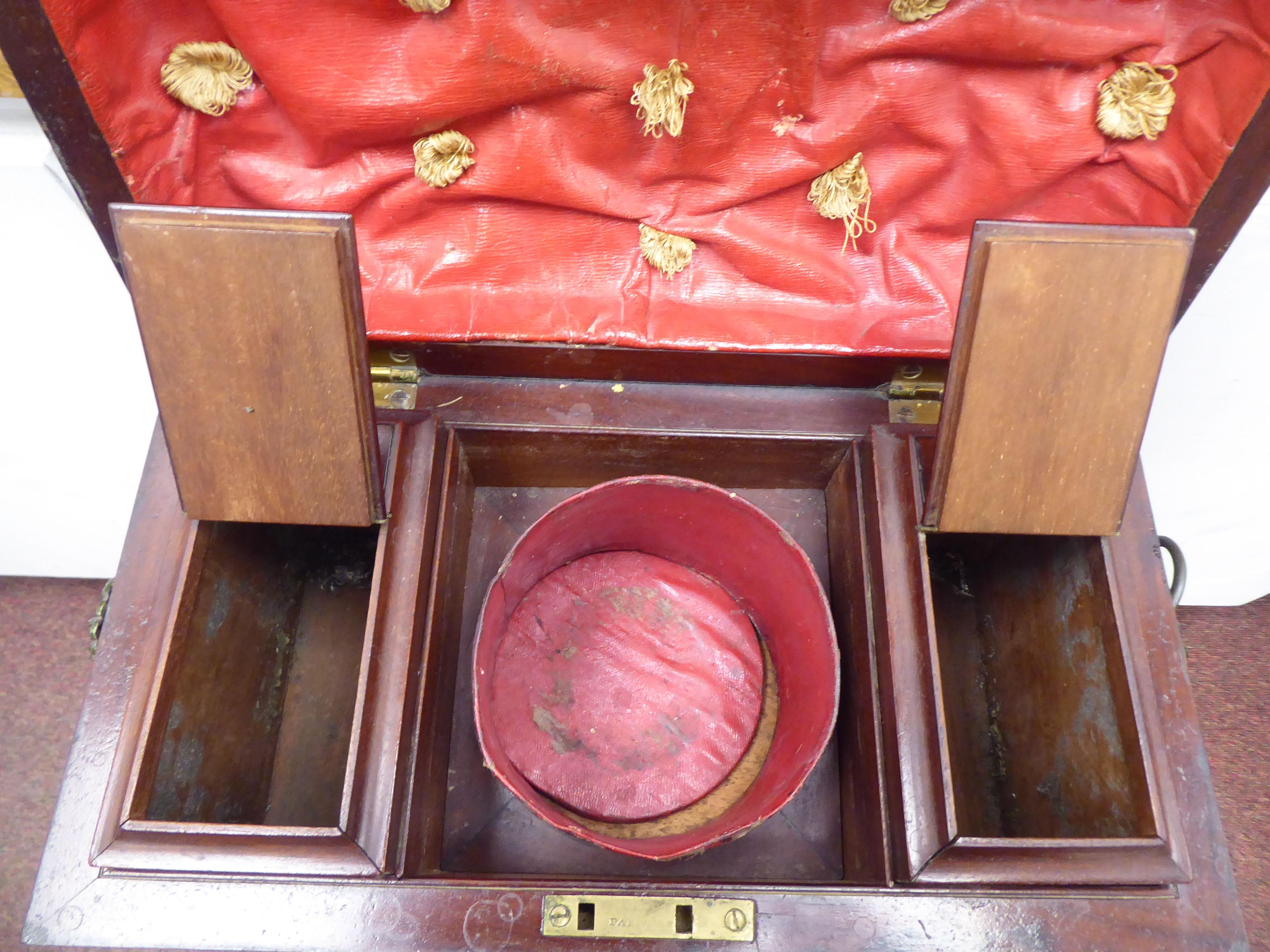 An early 19thC mahogany veneered tea casket of sarcophagus form, the hinged lid enclosing a pair - Image 4 of 5