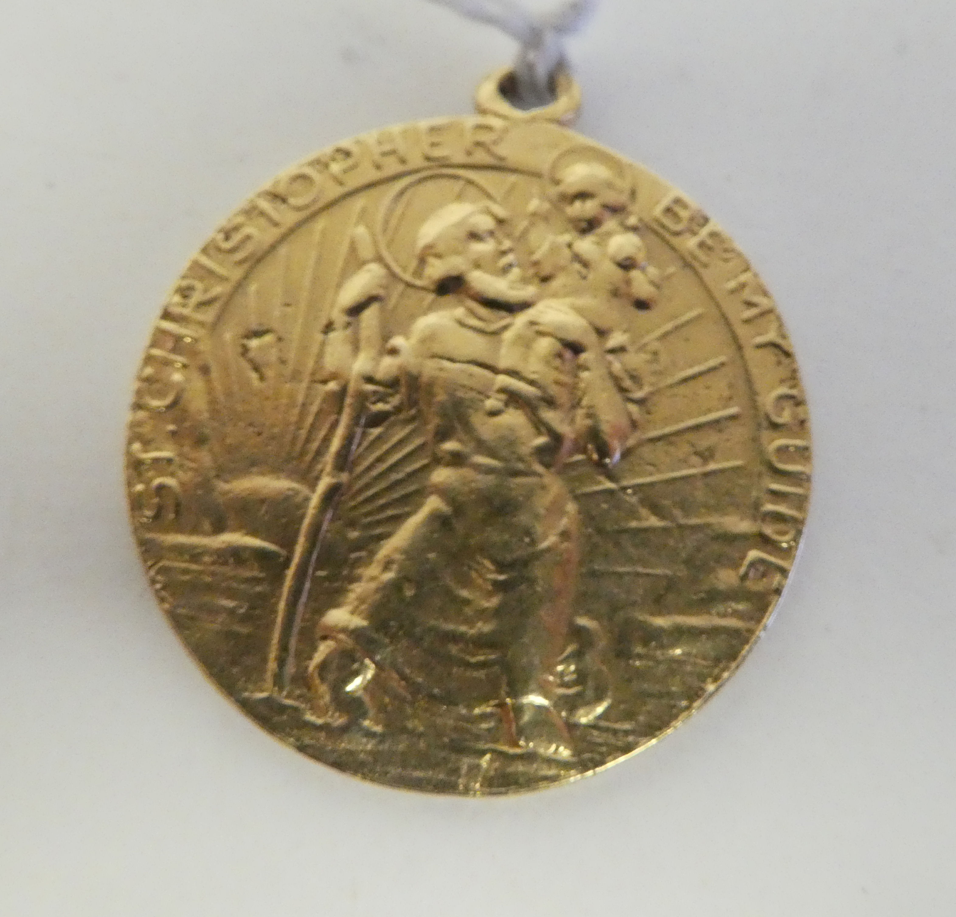 A 14ct gold St Christopher medallion, on a pendant ring with a map of North and South America on the - Image 2 of 2