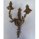 A Rococo design, two branch gilded metal applique  16"h