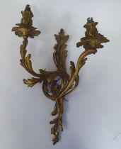 A Rococo design, two branch gilded metal applique  16"h