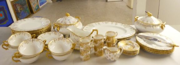 Two similar patterns of Royal Crown Derby china tea/dinnerware, highlighted with gilding