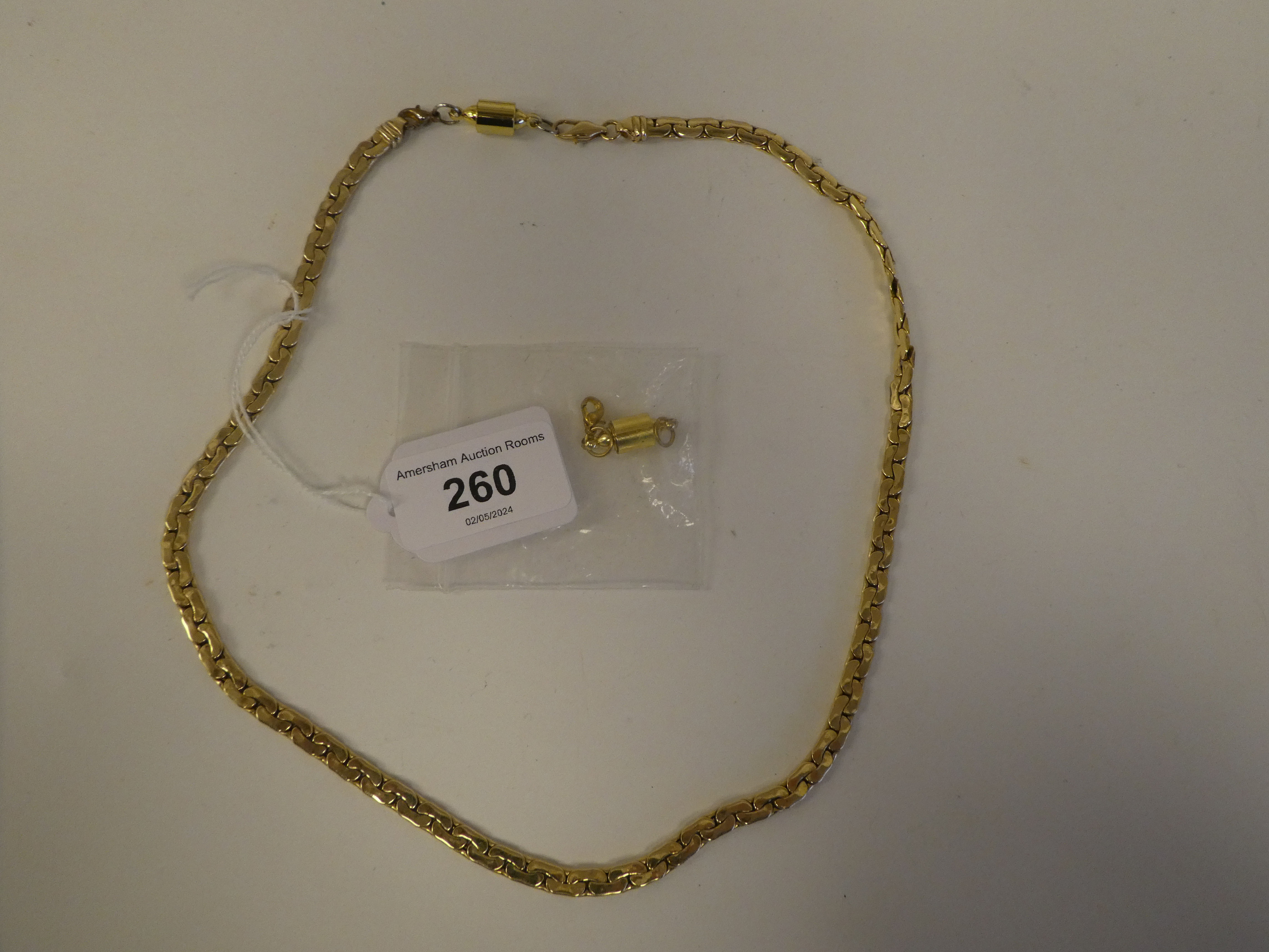 A 14ct gold flexible, fancy link neckchain, on a double dog clip clasp - Image 2 of 4