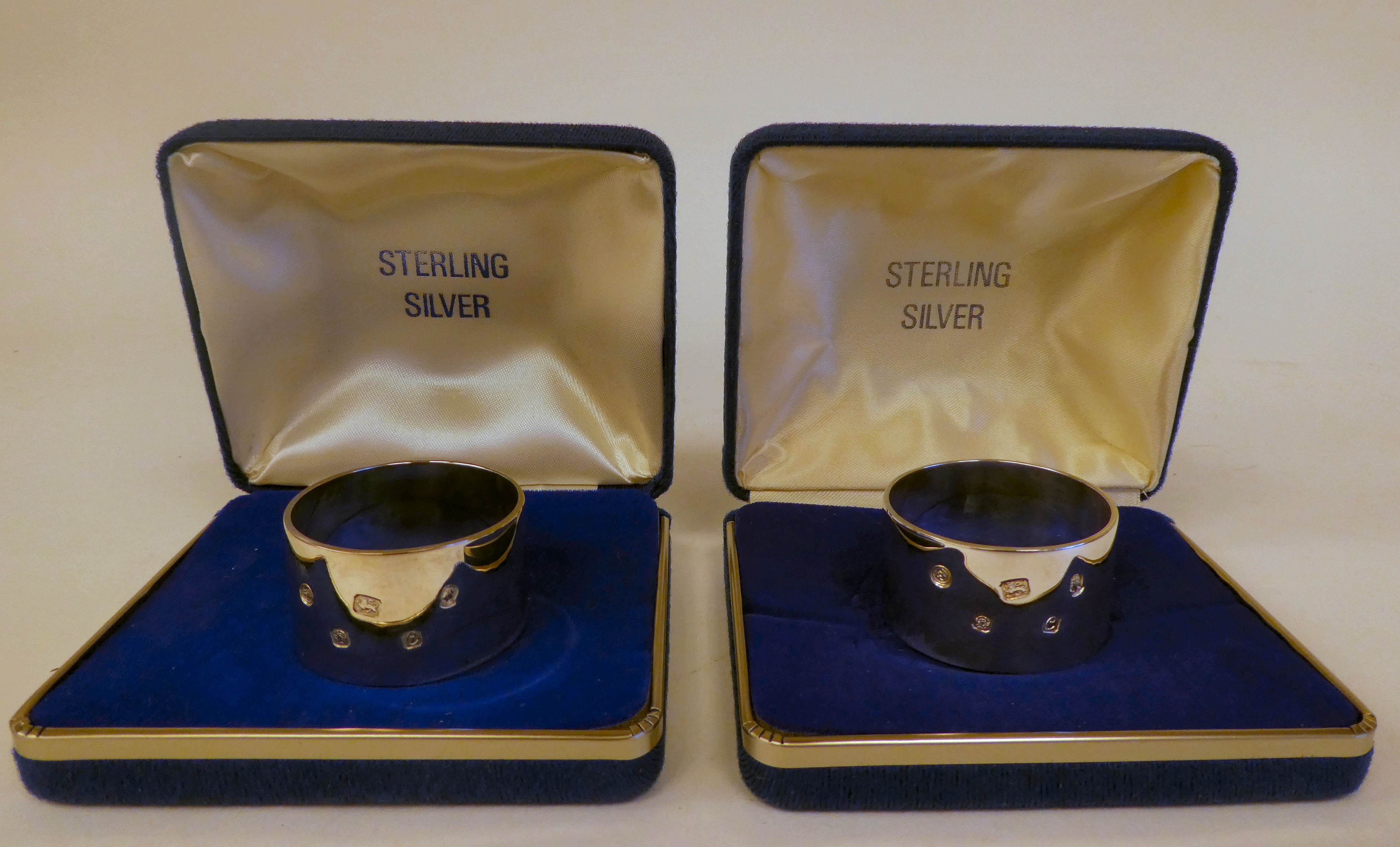 A pair of silver band design napkin rings  Francis Howard  London 1977  boxed