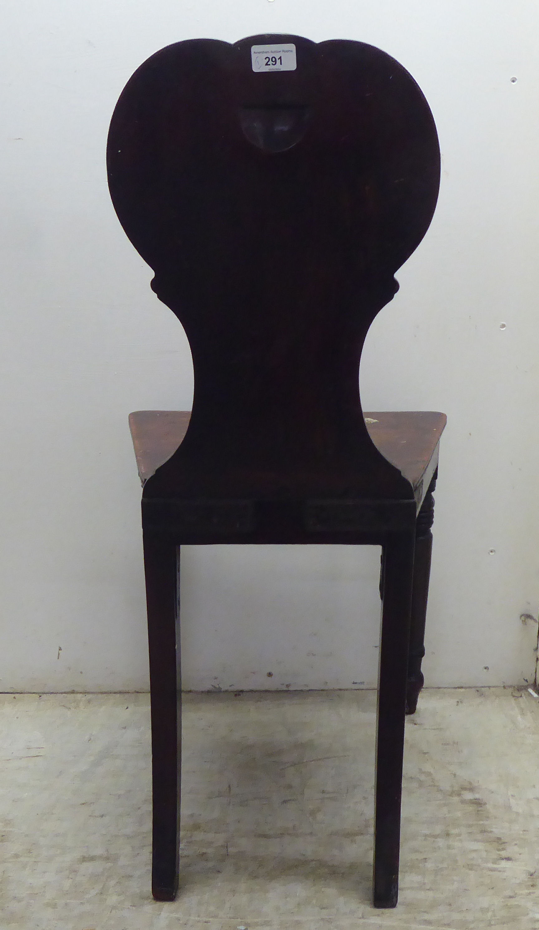 A William IV mahogany hall chair with a twin C-scroll design back, the solid seat raised on ring - Image 3 of 5