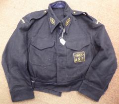 An LNER ARP Warden's black/blue worsted blouse (Please Note: this lot is subject to the statement