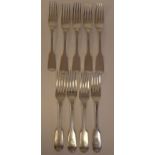 A matched set of nine silver fiddle pattern dessert forks  mixed marks  (approx. combined weight