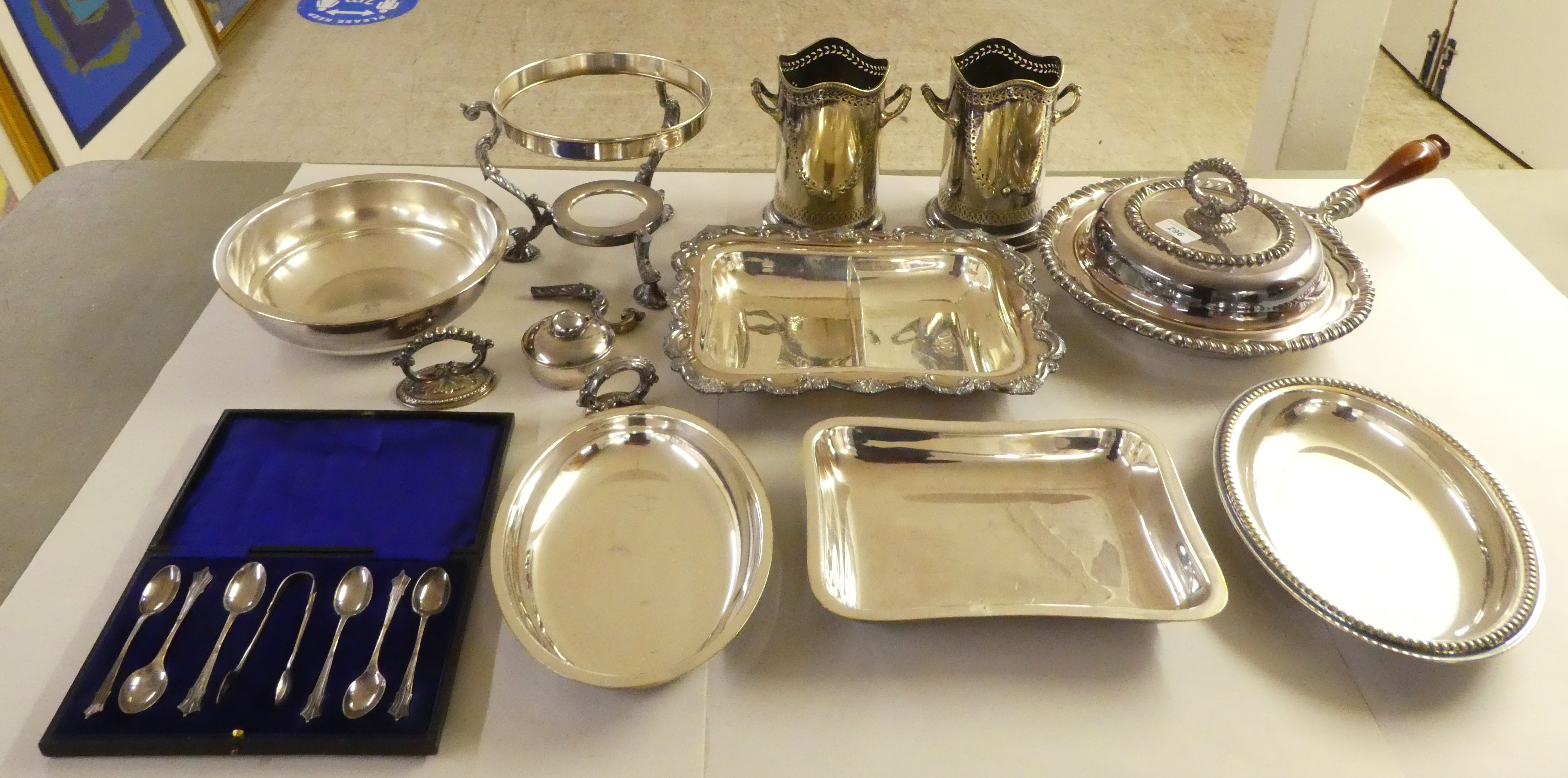 Silver plated tableware: to include a pair of twin handled bottle coasters  7"h