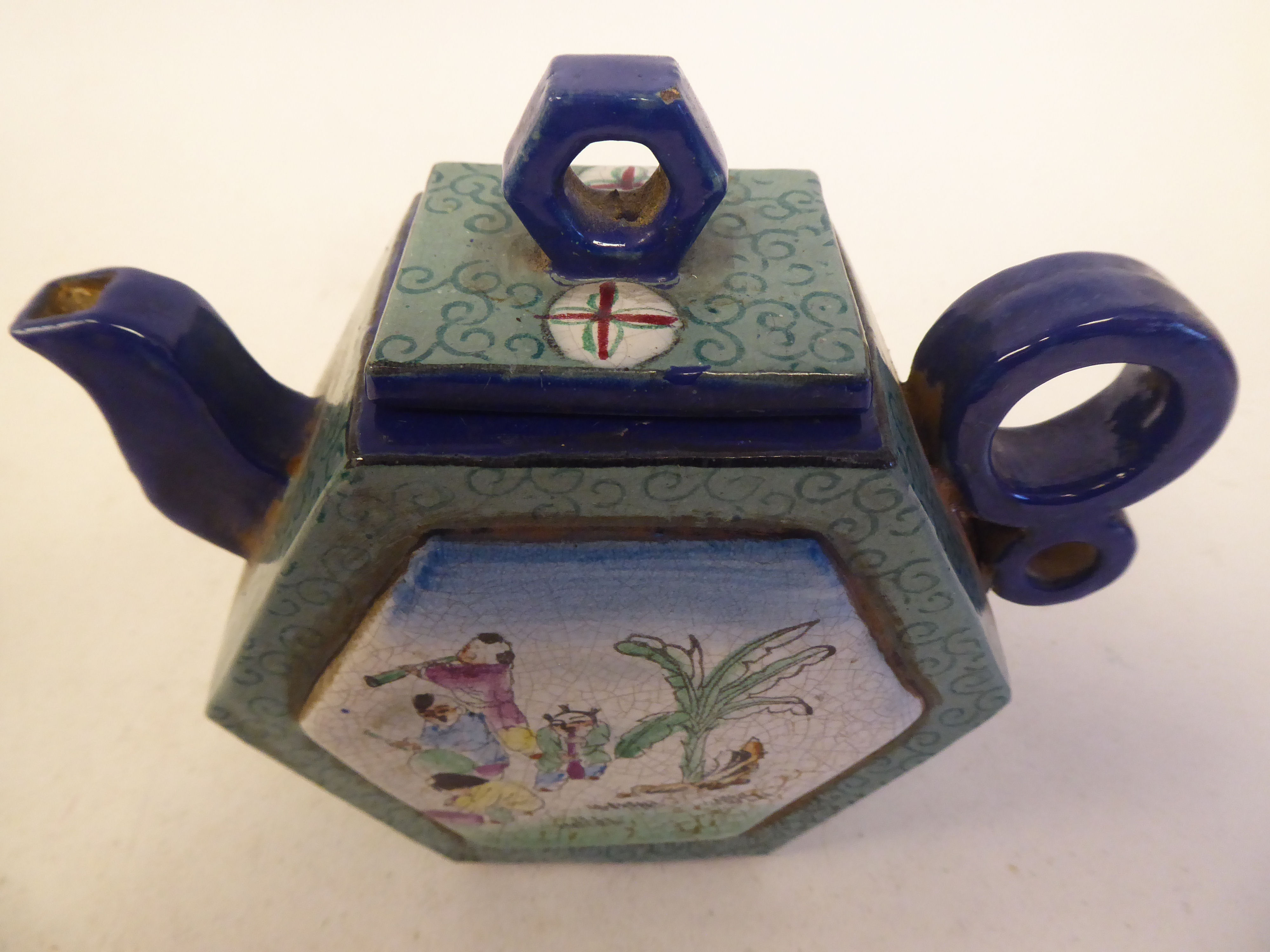 A Chinese Yixing porcelain teapot of hexagonal form with a stubby double ring handle, cover and - Image 2 of 4