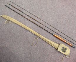 A Hardy Bros Reelholder, three section fly fishing rod, in a dedicated canvas bag