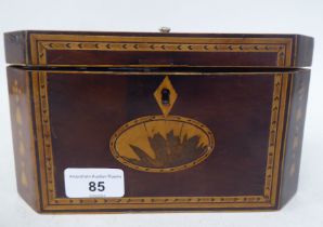 An early 19thC mahogany and marquetry, elongated, octagonal tea casket with straight sides and a