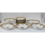 A late 19th/early 20thC Haviland porcelain dessert service, made by HG Stephenson, decorated with