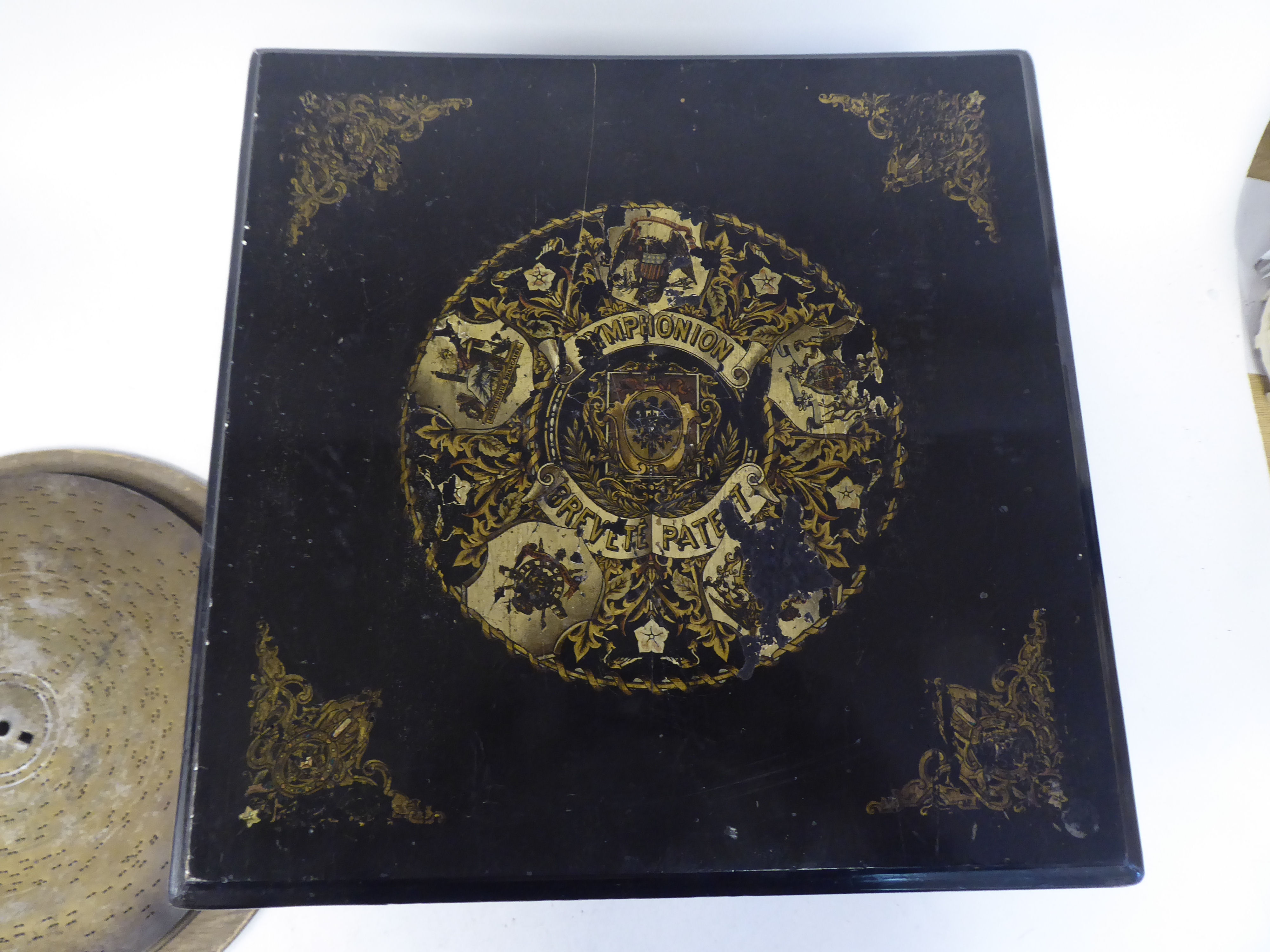 A late 19thC Brevete Patent black lacquered and gilded table-top Symphonion of box design with a - Image 5 of 5