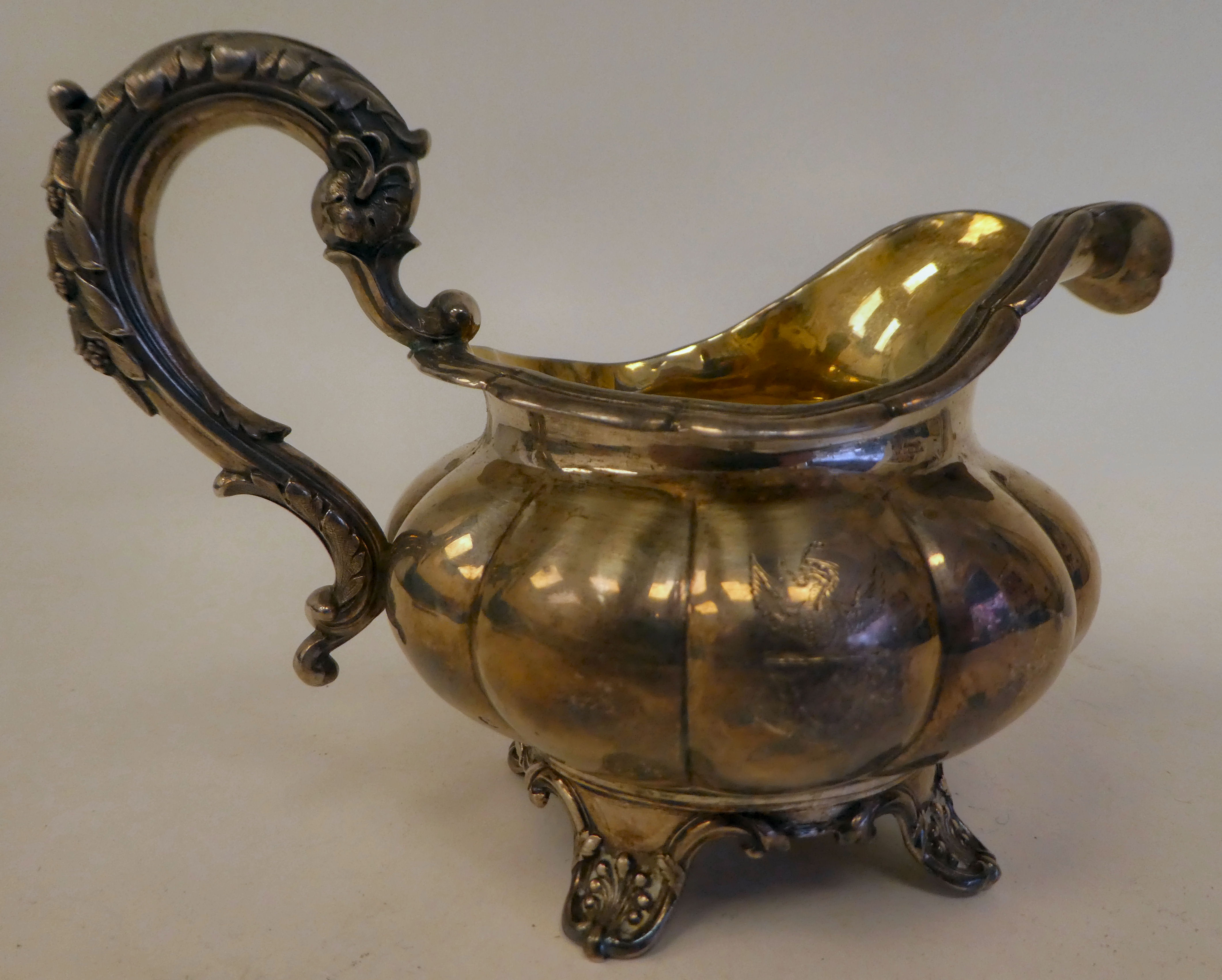 A George IV silver melon shape cream jug with a flared rim on S-scrolled handle, on a shell cast - Image 2 of 4